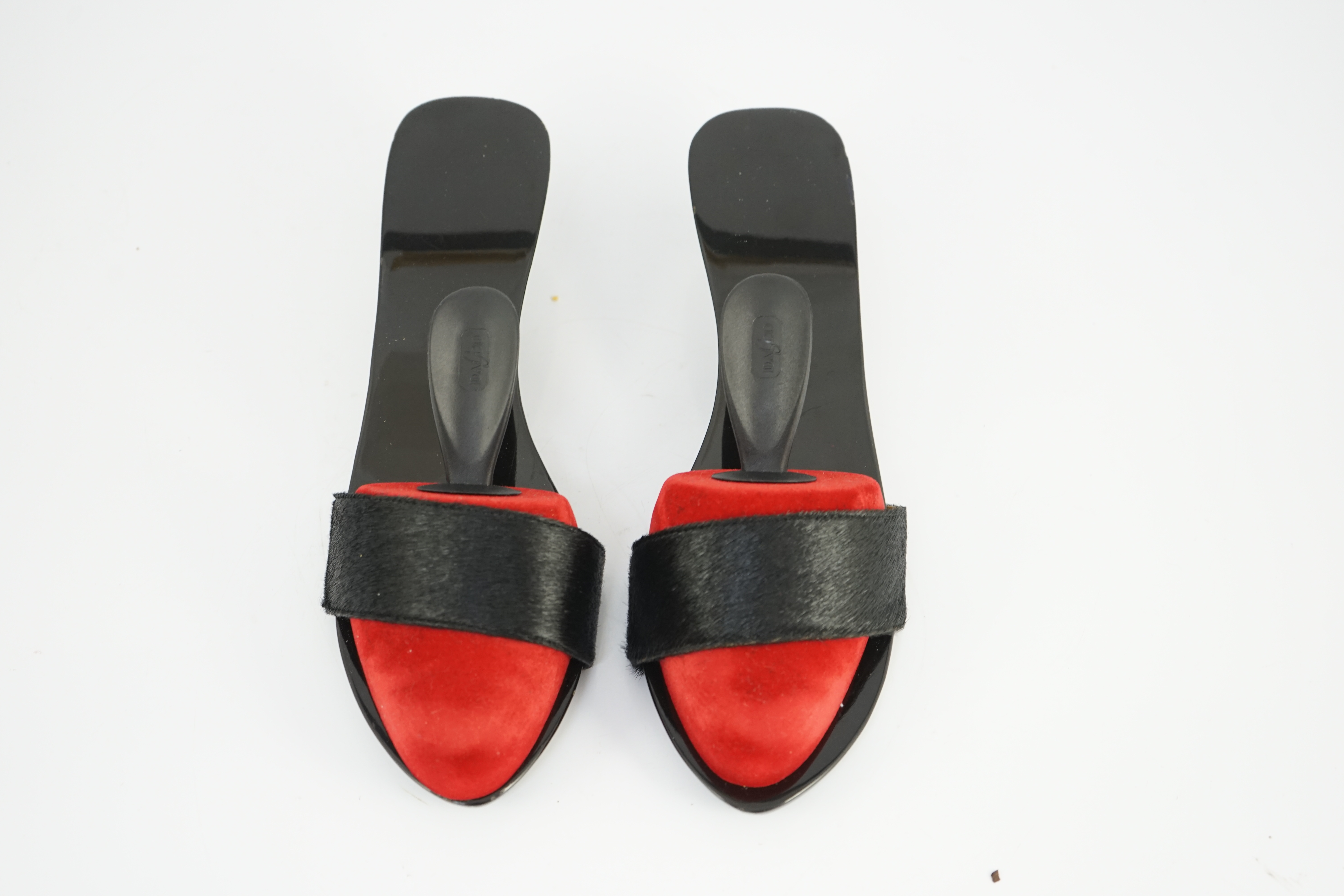 A pair of Hermès black pony skin and lacquer mules, Size 39